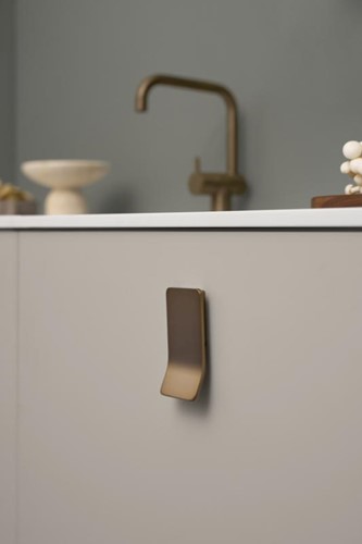 Meubelgreep Leaf 32 champagne op kast